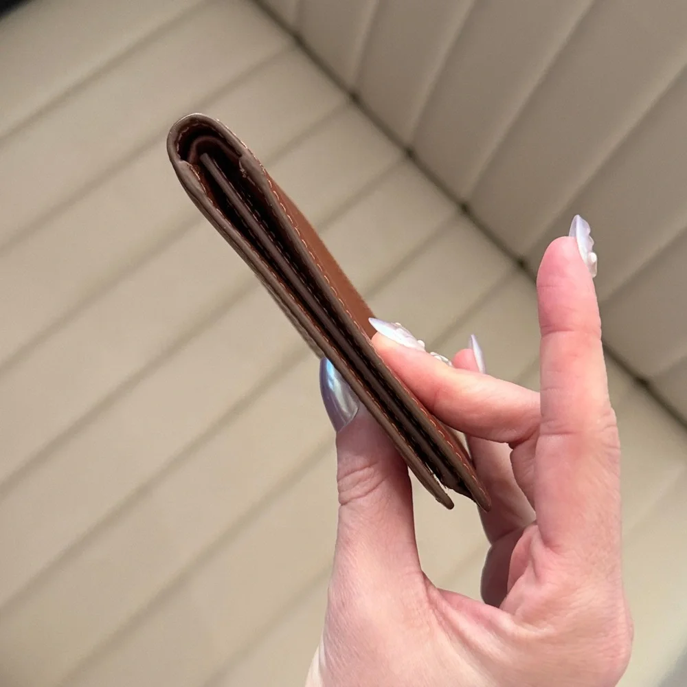 Fossil Tan Geometric Embossed Leather Bifold Wallet